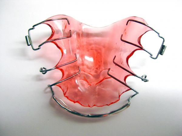 Retainer with a Coated Labial Bow